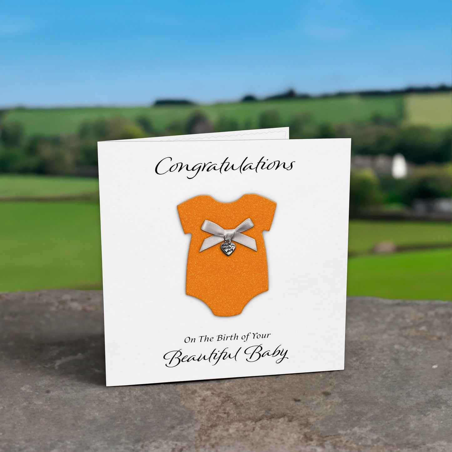New Baby Card (Heart Charm & Bow) - White Cardstock / Neon Orange Glitter