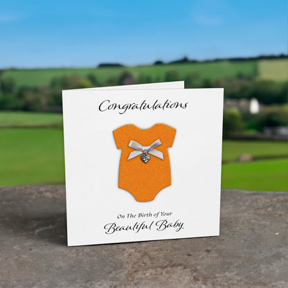 New Baby Card (Heart Charm & Bow) - White Cardstock / Neon Orange Glitter