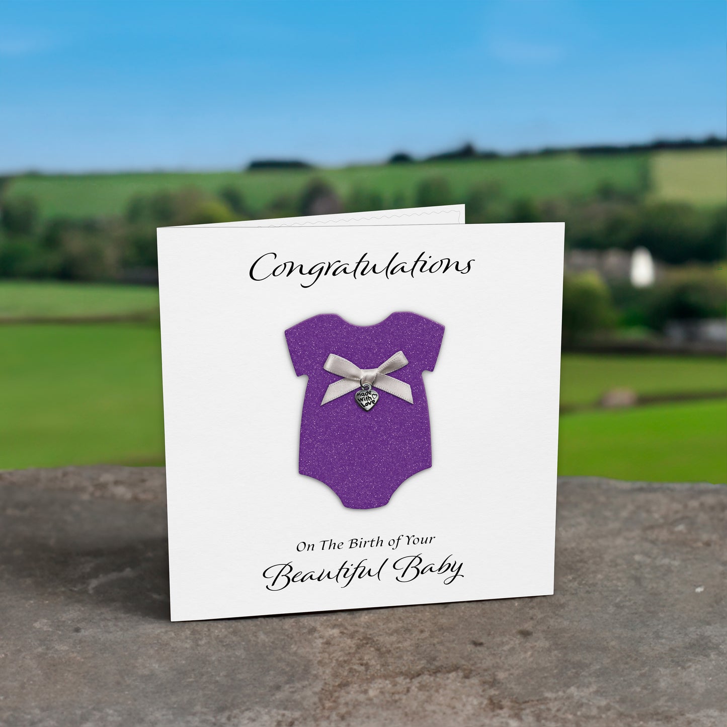 New Baby Card (Heart Charm & Bow) - White Cardstock / Purple Glitter