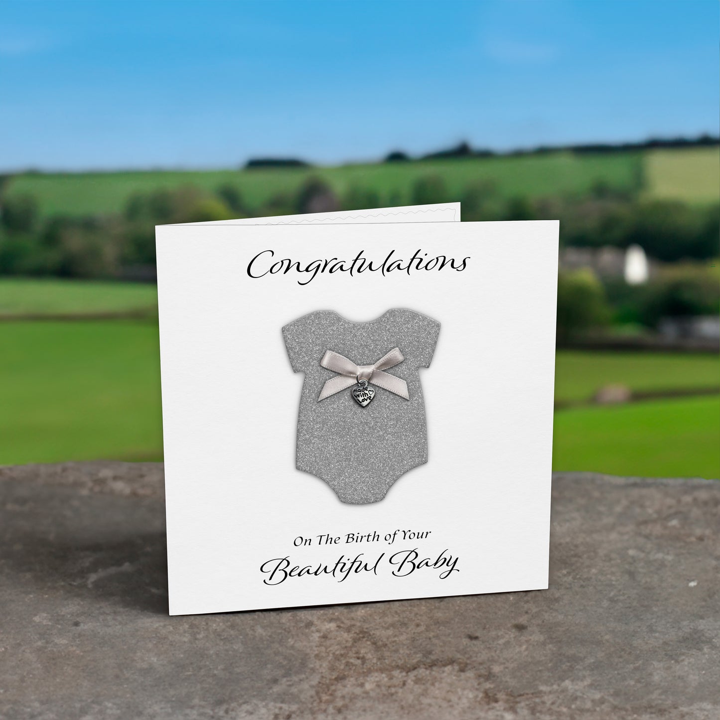 New Baby Card (Heart Charm & Bow) - White Cardstock / Silver Glitter
